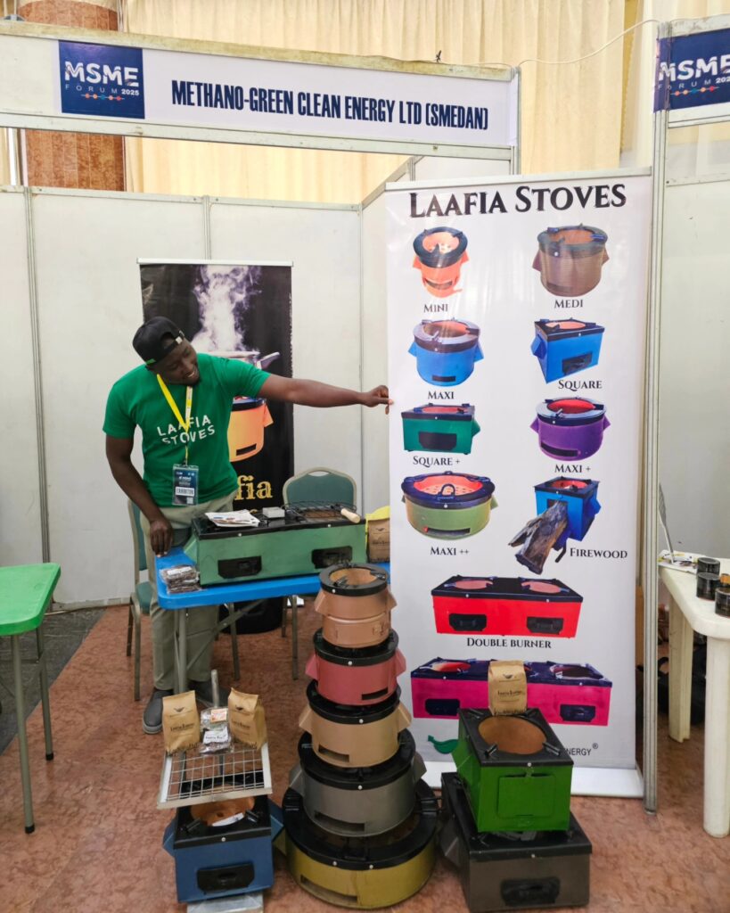Methanogreen exhibitor with Laafia stoves at the 4th MSME Forum in Abuja, June 2025